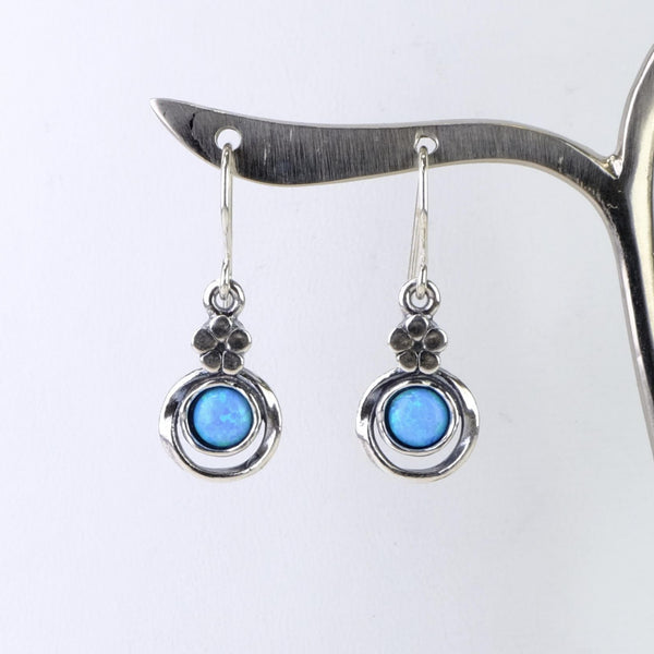 Opal and Silver Flower Design Earrings.