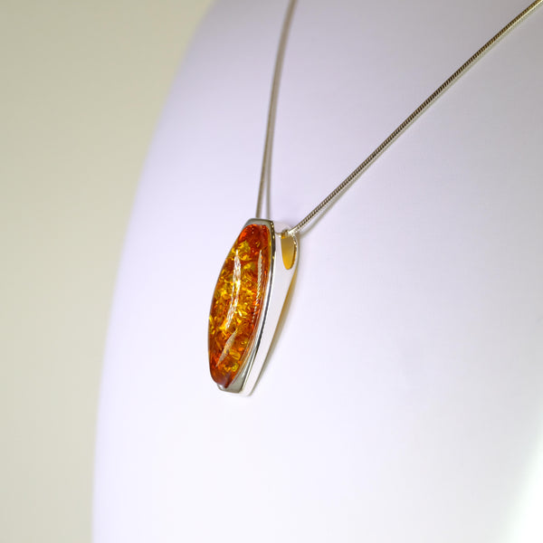Simple Cognac Amber and Silver Pendant.