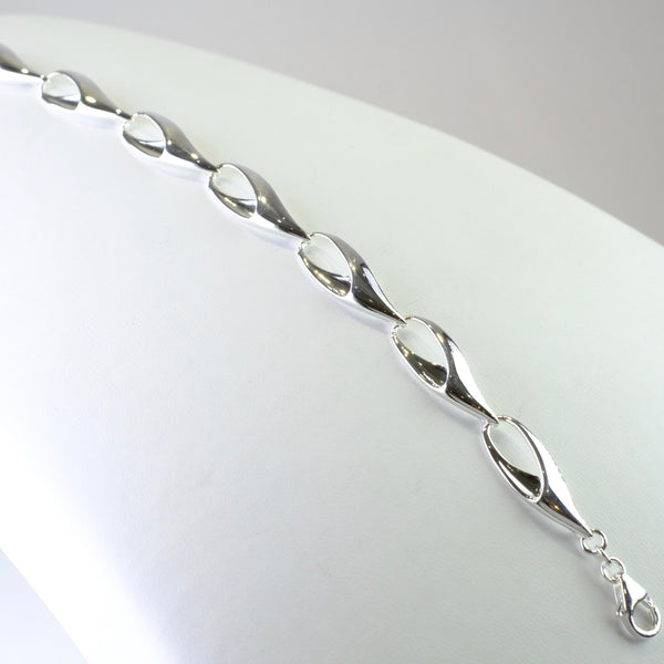 Polished Silver Linked Bracelet by JB Designs.