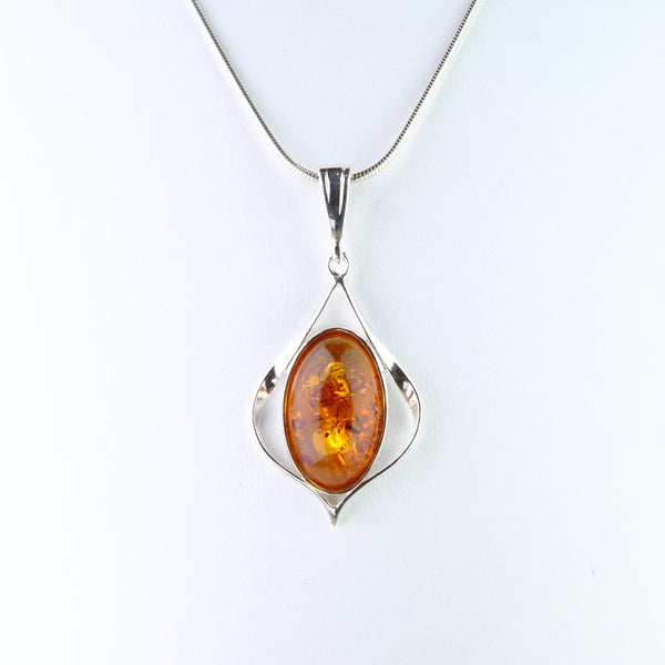 Elegant Amber and Silver Pendant.