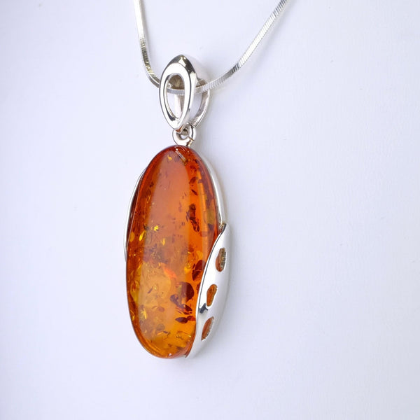 Long Oval Amber and Silver Pendant