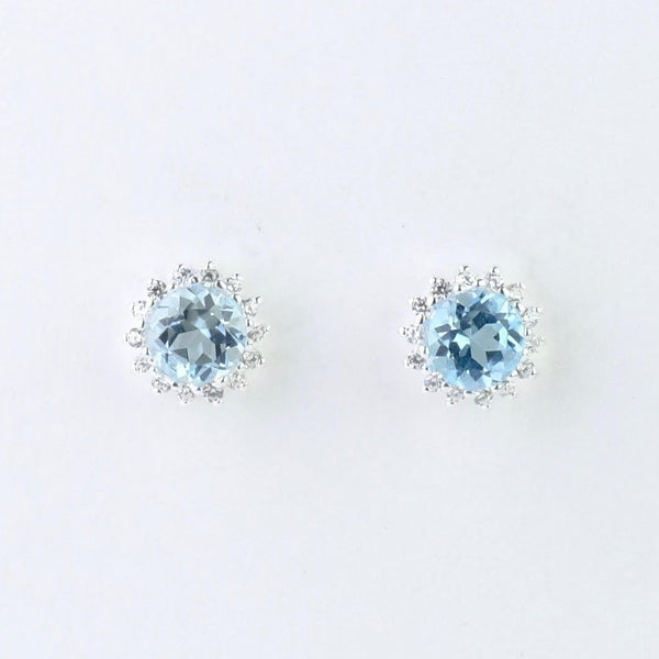 Silver, Blue Topaz and CZ Stud Earrings by JB Designs.