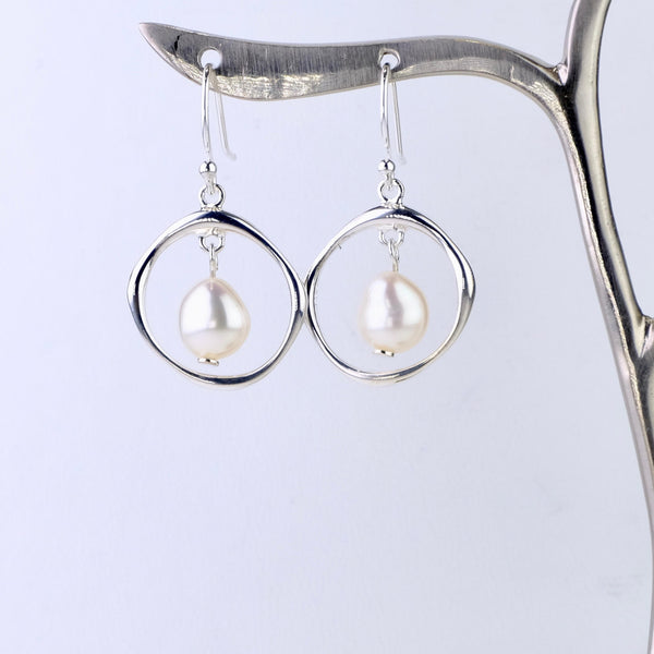 Pearl in a Sterling Silver Ring Drop Earrings.