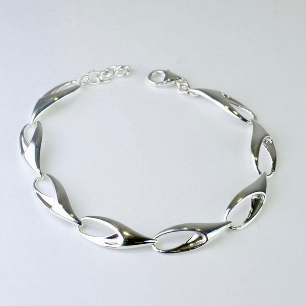 Polished Silver Linked Bracelet by JB Designs.